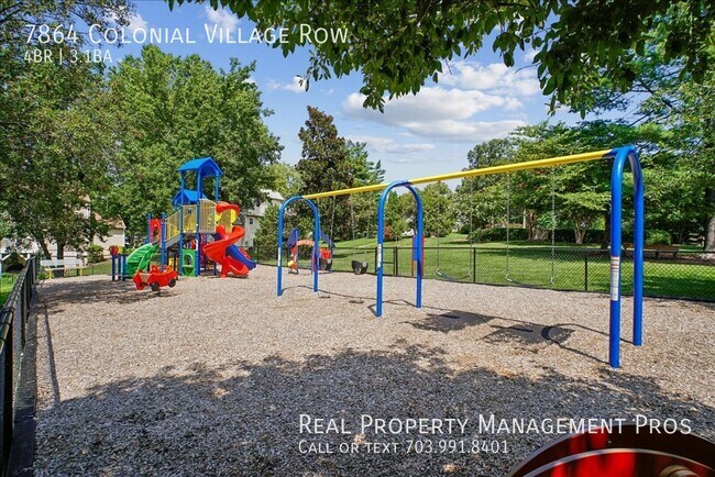 Building Photo - 7864 Colonial Village Row