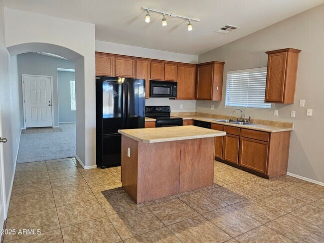 Building Photo - 45360 W Woody Rd