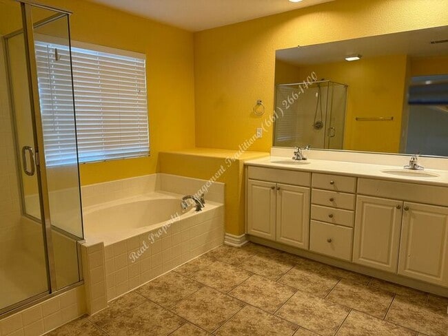 Building Photo - New Year Special! 50% Off First Months Rent!