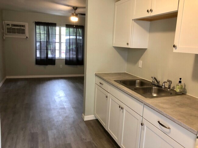 Newer cabinets and countertops, too! - 9803 N Aster Ave