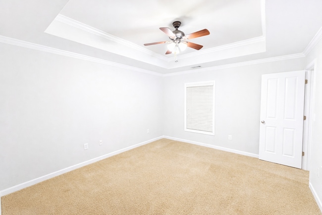 Building Photo - Gated Johns Creek Townhome Offering Space, Privacy, and Everyday Convenience