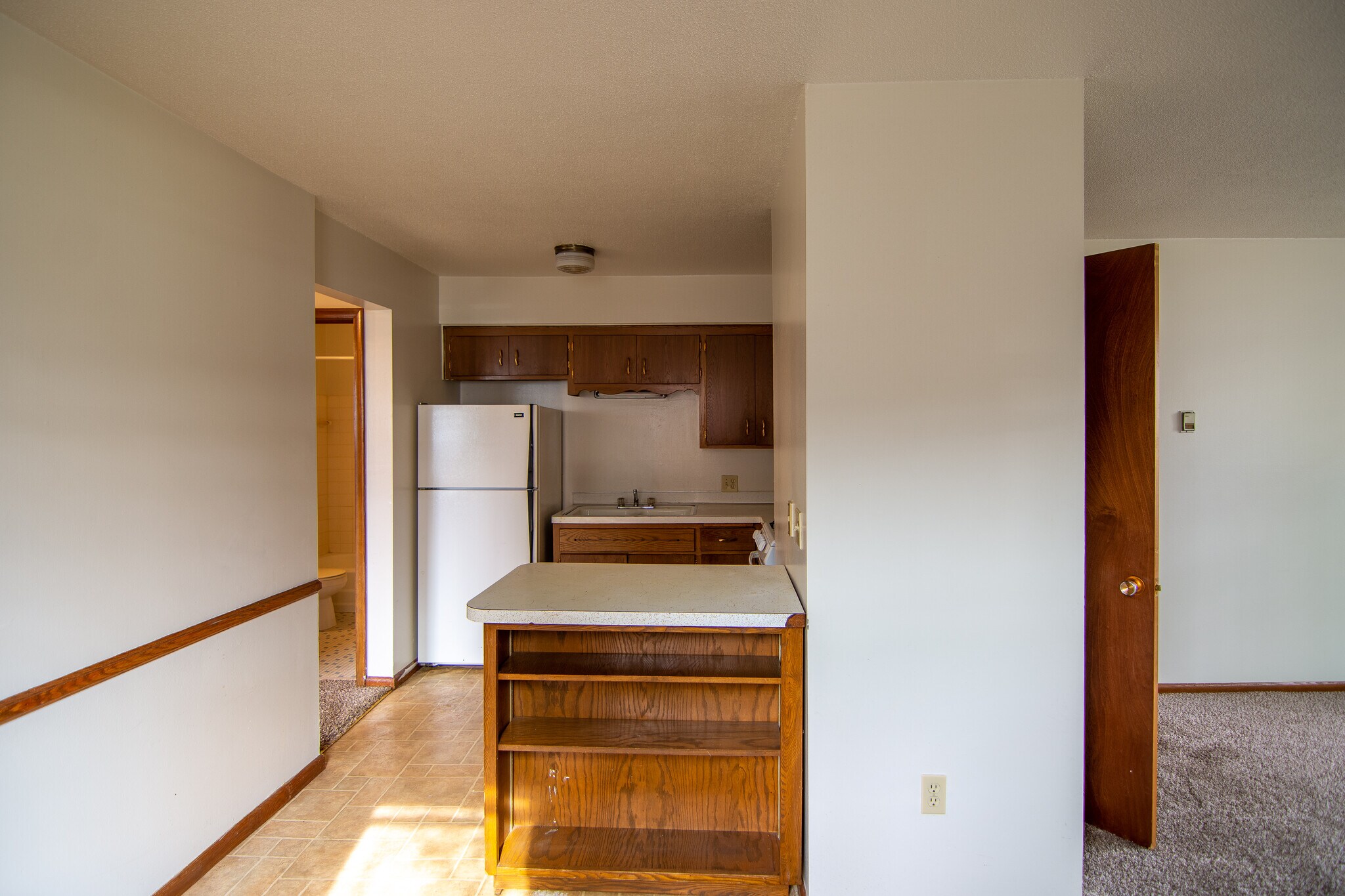 kitchen from dining room - 117 Mississippi Pl