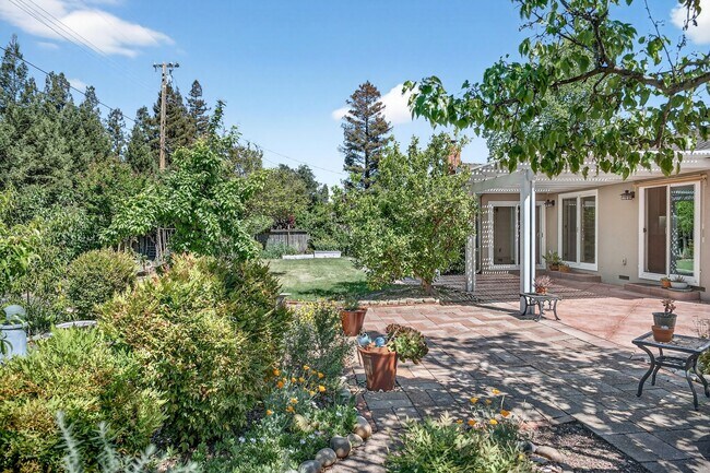 Building Photo - 2,003 Sq Ft Modern 4BR/2BA: Solar, EV Charging & Private Orchard!