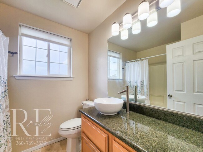 Building Photo - Modern Elegance Meets Tranquil Lakeside Living On Osprey Circle