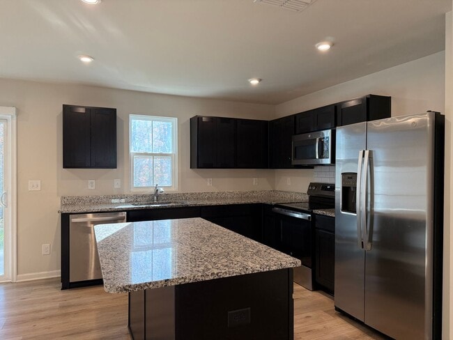 Building Photo - Modern 3-Bedroom Townhouse with Garage & Private Patio