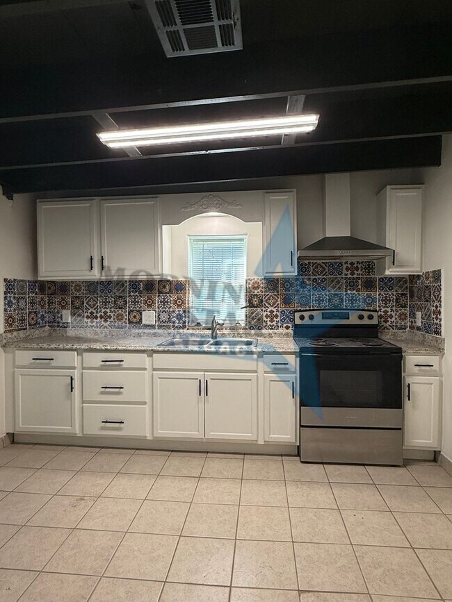 Building Photo - Charming Updated Home w/ Enclosed Yard & Storage