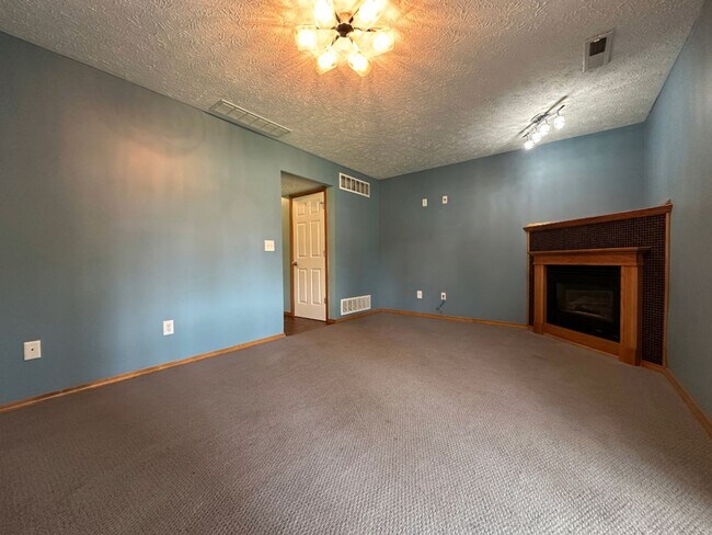 Building Photo - Sophisticated Townhome Living with Modern ...