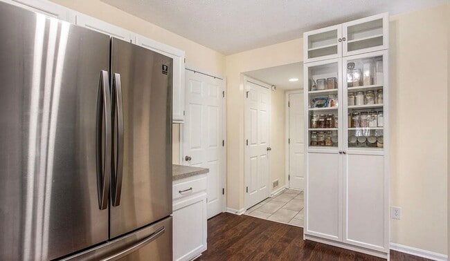 Building Photo - Charming 3-Bedroom End Unit Condo – Prime ...