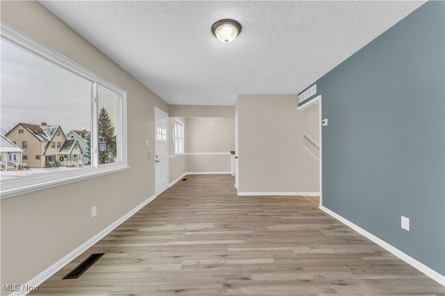 Building Photo - 7611 Newport Ave