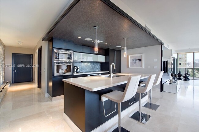 Building Photo - 5875 Collins Ave