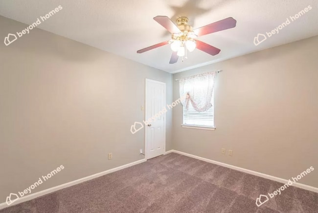 Building Photo - Updated 3BD/1.5BA Gem with Fireplace & Fen...