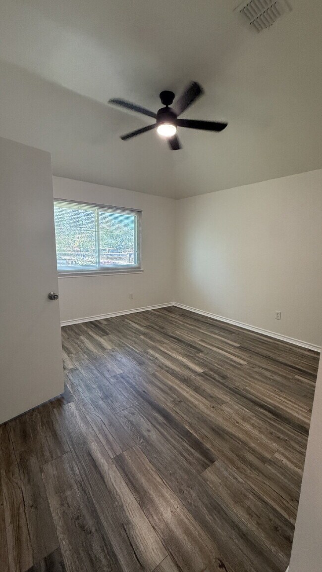 Building Photo - Updated 4-Bedroom 2 Bathroom Austin Home with Beautiful Backyard