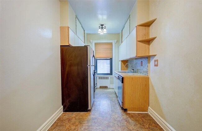 Building Photo - 76-66 Austin St