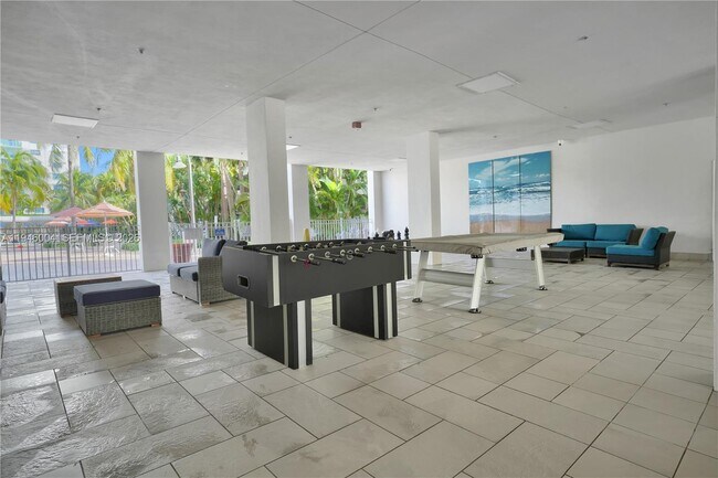 Building Photo - 19380 Collins Ave