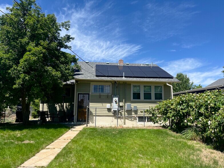 large back yard with patio to the left - 4970 Wyandot St