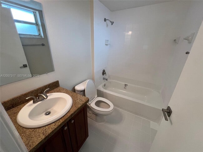 Building Photo - 3261 Sabal Palm Manor