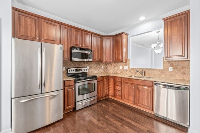 Building Photo - Charming Full-Brick Townhome in the Heart of South End