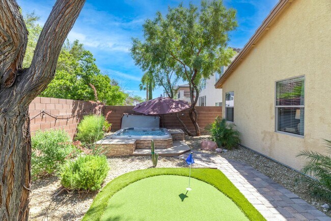 Building Photo - Spacious Mountain’s Edge Home with Den, Sunroom, 3-Car Garage & Private Spa Retreat