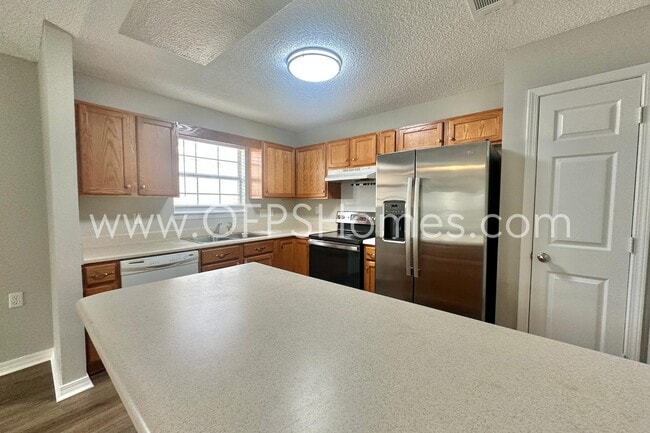 Building Photo - 5593 Shadow Shore Pl
