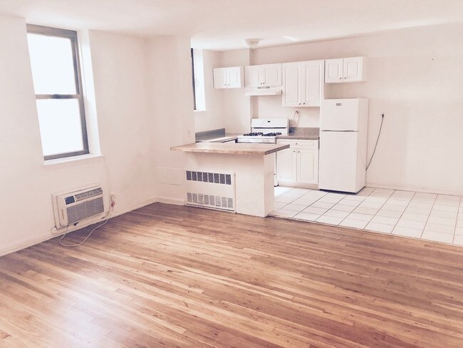living room and kitchen - 300 E 49th St