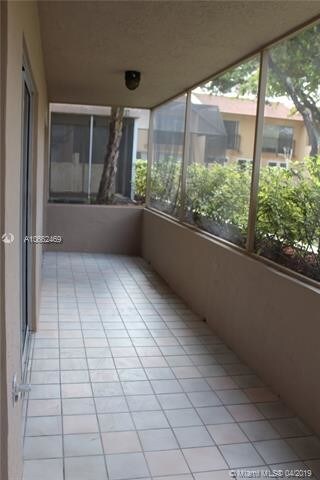 Building Photo - 4680 NW 102nd Ave  104-20