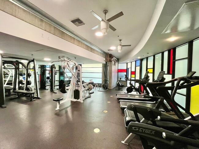 Building Photo - Stunning Corner Loft in East Village with Floor-to-Ceiling Windows & City Views!