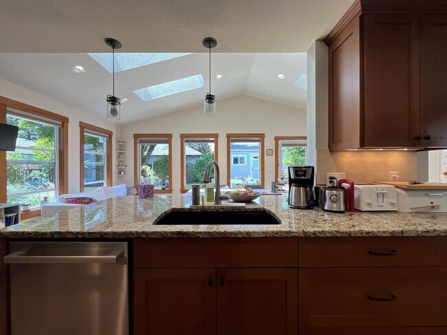 Building Photo - Bright and Open 4 Bedroom Cedar Mill Home with Vaulted Ceilings, Skylights & Multiple Living Areas