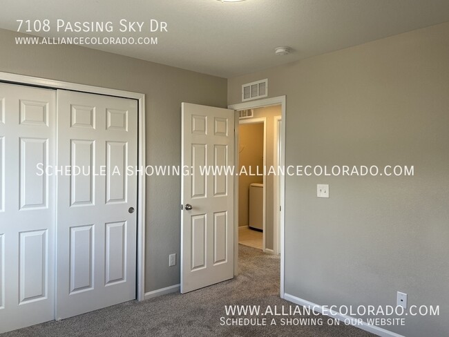 Building Photo - 7108 Passing Sky Dr