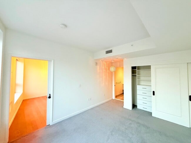 Building Photo - ***MOVE-IN SPECIAL ONE MONTH FREE RENT***Very Unique Spacious Two Bedroom - Two bath luxury Condo...
