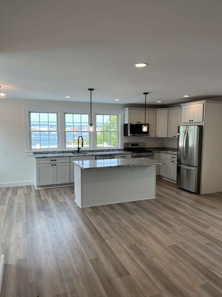 Open living with harbor views - 169 E Main St