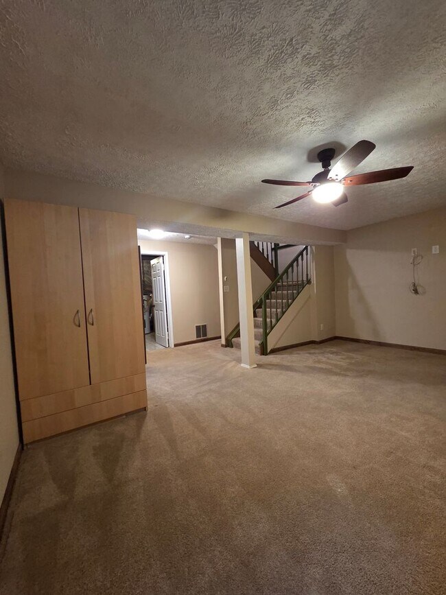 Building Photo - Serene Living in a Quiet Lakeside Community