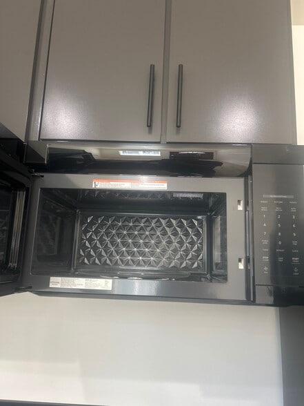 New microwave - 8901 Firestone Plz
