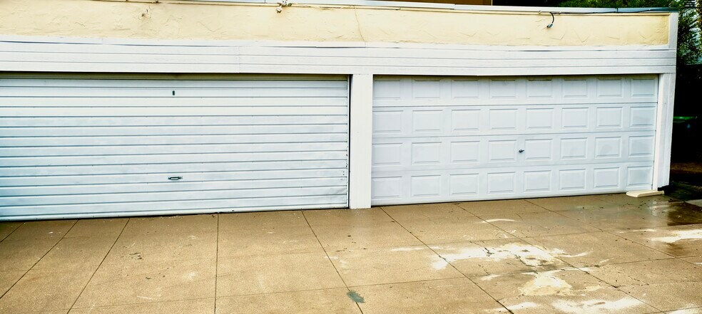 Garages in locked fence area - 1925 N Commonwealth Ave