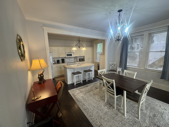 Kitchen opens to dining area. - 339 Whitaker St