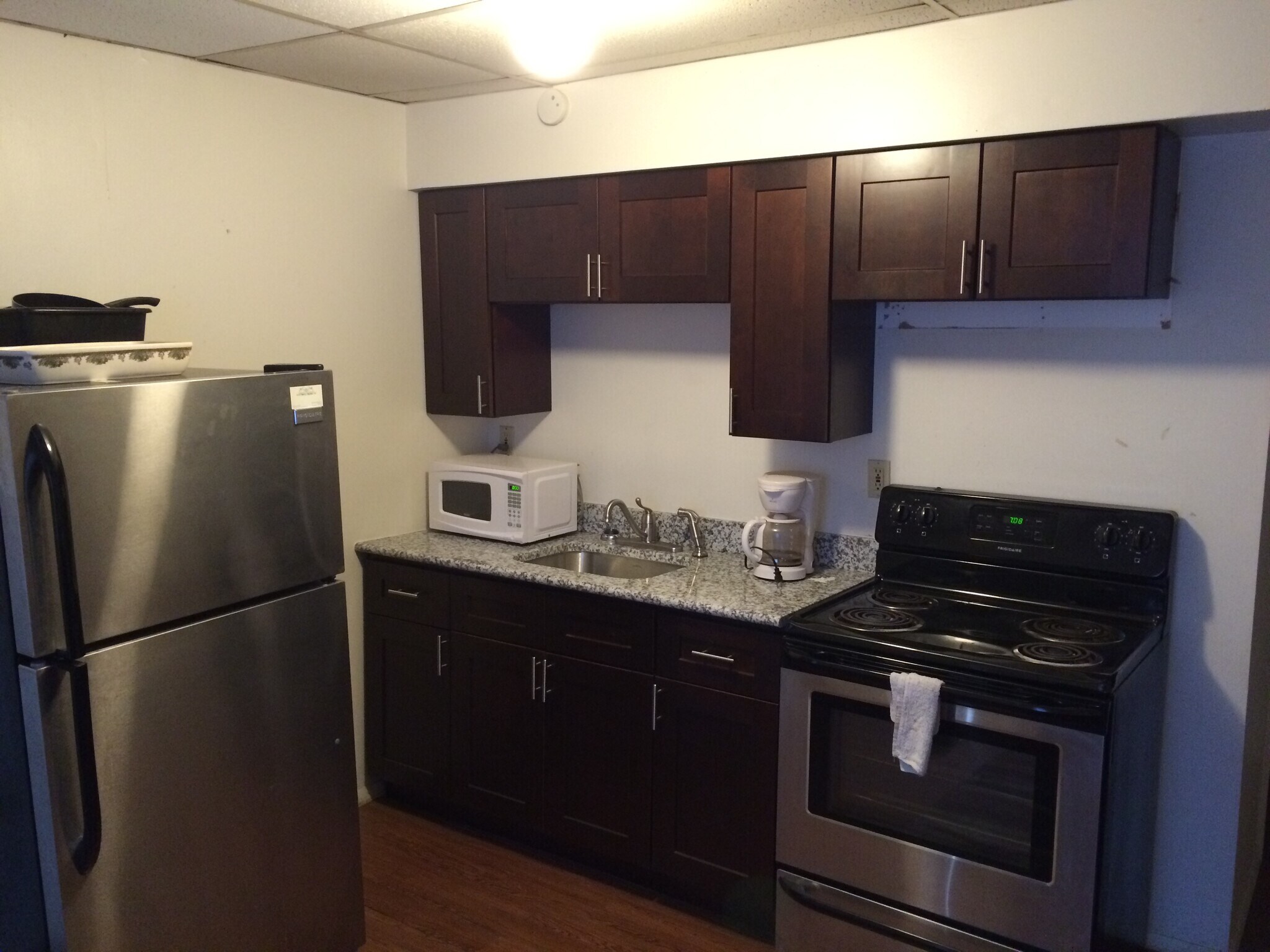 New custom kitchen cabinets with soft-close drawers and doors, dove-tailed drawers, granite countertops, and new stainless appliances! - 539 Blaine Avenue