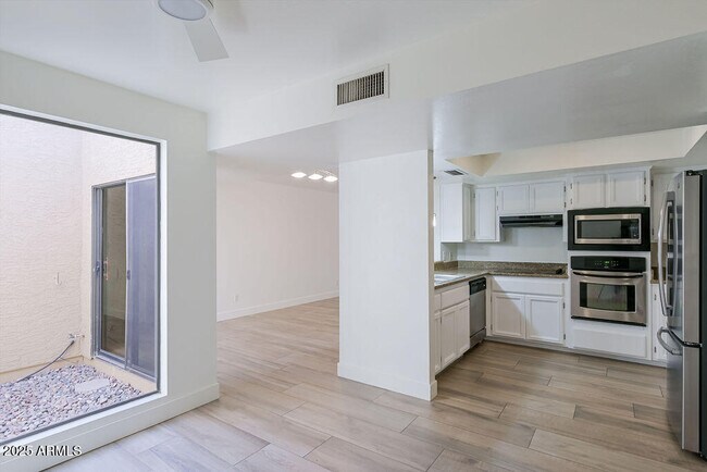 Building Photo - 7943 E Montebello Ave