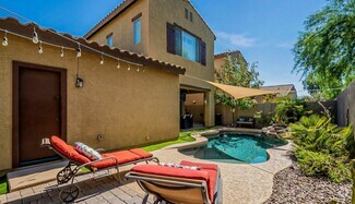 Backyard with pool, BBQ grill, patio table & chairs - 280 E Indigo Dr