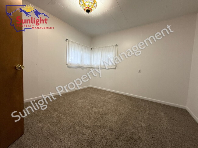 Building Photo - Wide Open Space, Peaceful and Safe 2 Bed 1...