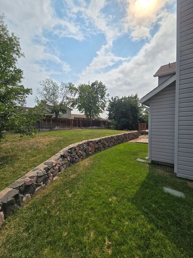 Building Photo - 3409 E 99th Dr