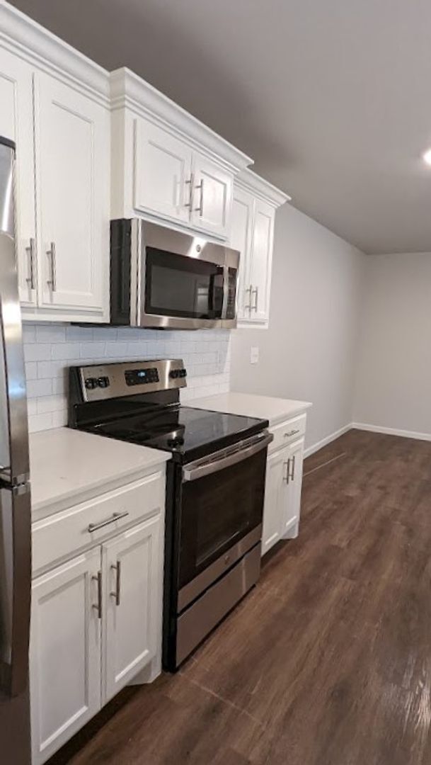 Building Photo - 3 Bed 2 Bath 2 Car Duplex Freedom Villas in Midwest City, OK