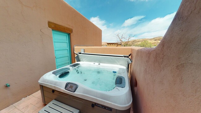 Building Photo - Custom Adobe style home in exclusive Navaj...