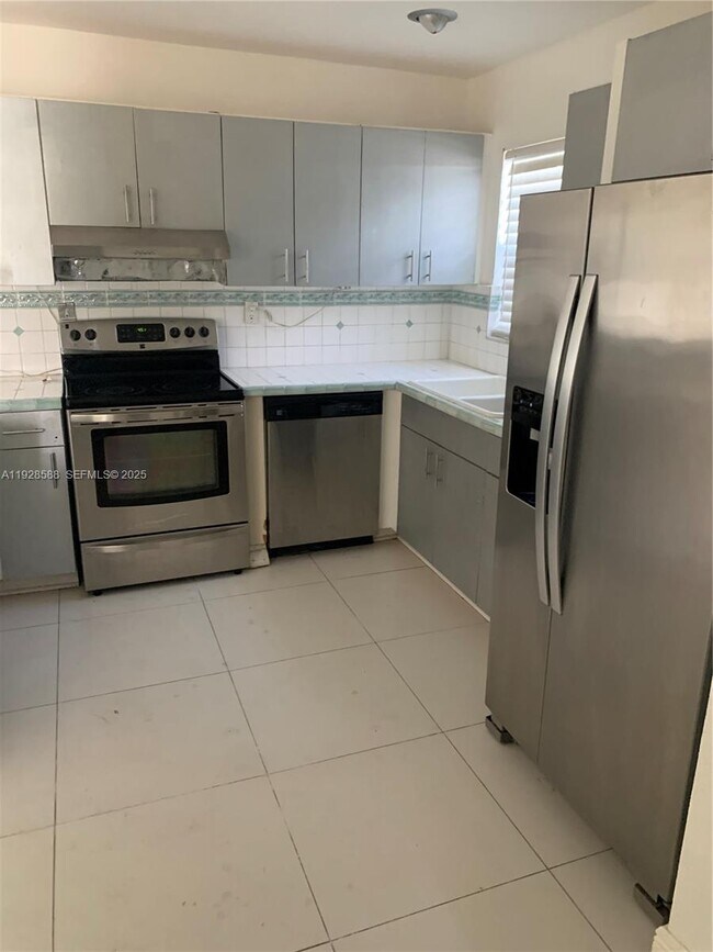 Building Photo - 14300 SW 105th Ave