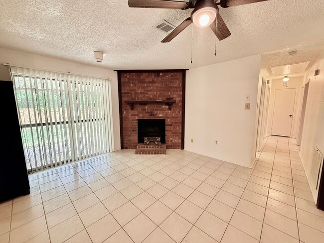 Building Photo - Charming 3BR/2BA Brick Home in Perkins Village – Spacious Yard & Cozy Fireplace