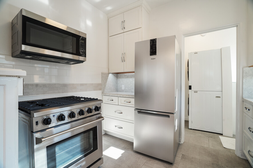 Kitchen with stainless steel Appliances - 1557 S Genesee Ave