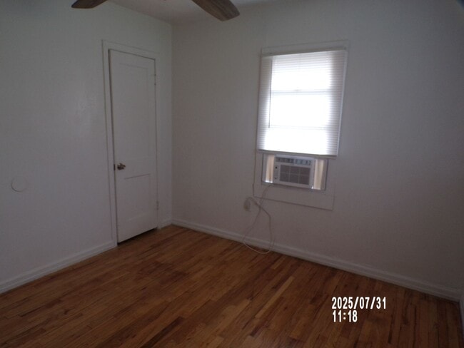 Building Photo - NEW listing-refinished hardwood floors, new laminate and paint throughout