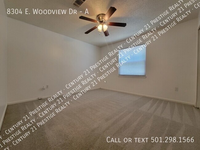 Building Photo - 8304 Woodview Dr N