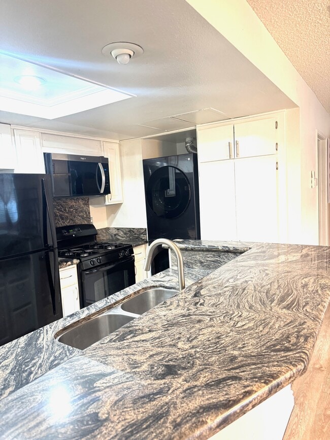 new washer & dryer - 8463 De Soto Ave