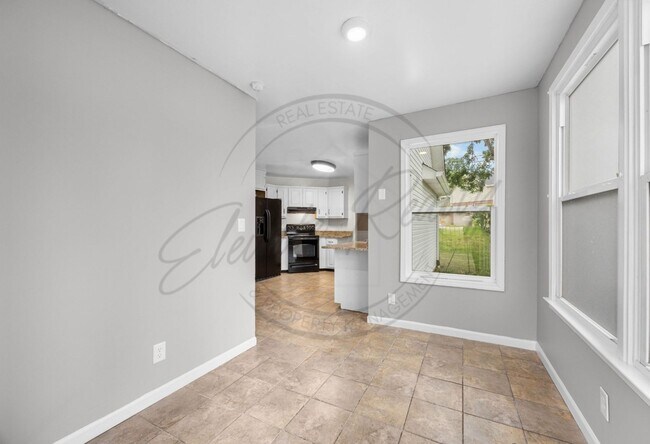 Building Photo - Four Bedroom Two Story with Two Car Garage...