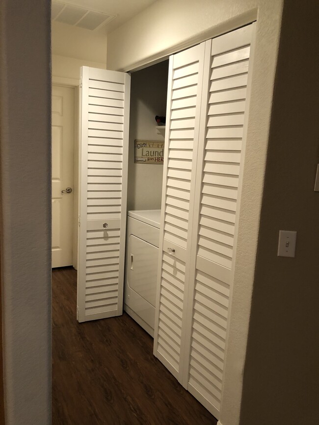 Laundry Closet w/Storage Above - 555 Lands End Way