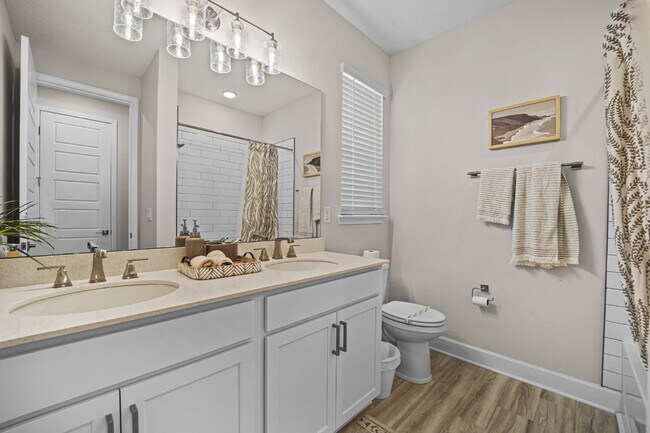 Building Photo - "Luxurious Furnished Home with 4-Bed, 3-Bath, Swim Spa Fenced Yard Golf Cart steps to the beach!"